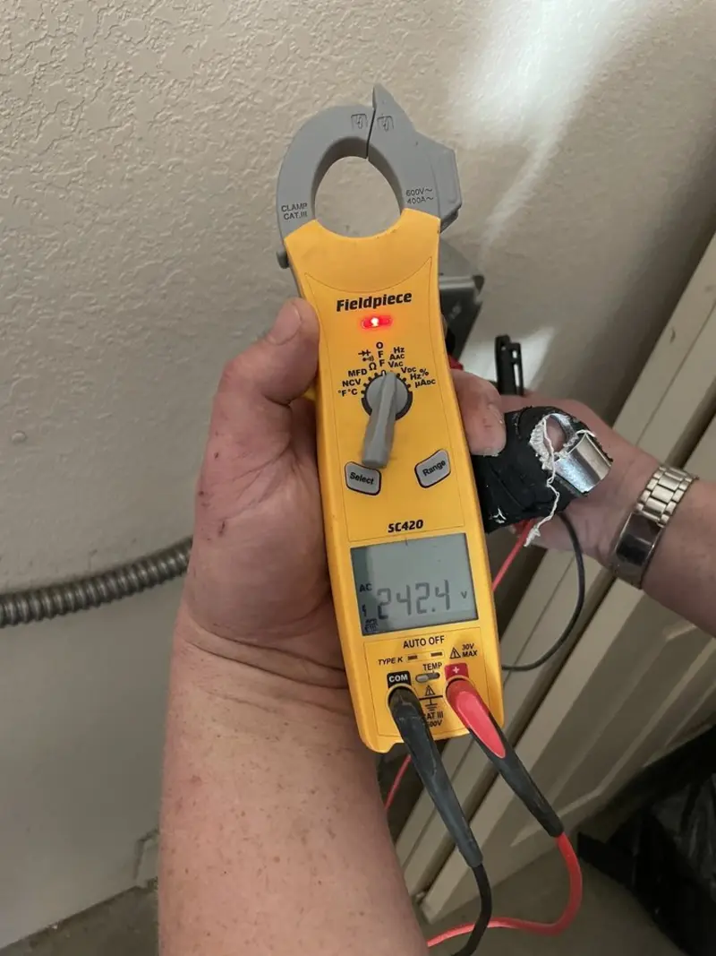 Voltage testing with clamp meter during Generator Installation in Westlake
